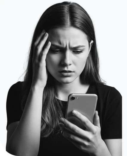 A traveler looking frustrated at her phone